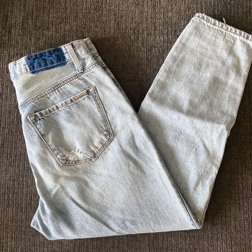 Distressed skinny ankle jeans in light wash